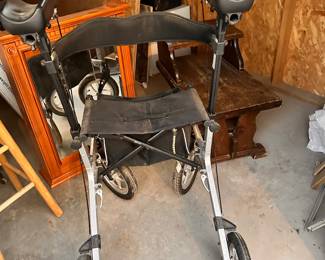 Walking wheelchair, vintage telephone table, bathroom medicine cabinet