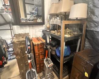 Vacuumes, mirrors, vintage trunks