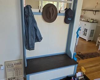 Seat and jacket holder with storage under  the seat 