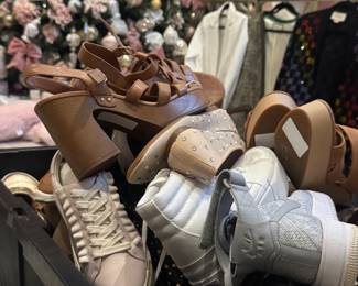 Bins and bins of shoes (will be displayed) 