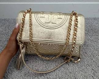 More than 30 Tory Burch bags 