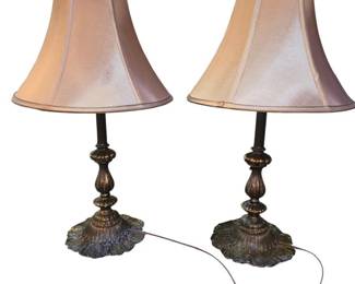 Pair of Rustic Traditional Bronze Finished TableLamps Featuring An Intricate Leaf Patterned Base and a Neutral Toned Shade
