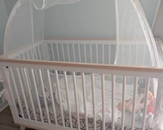 One of three cribs