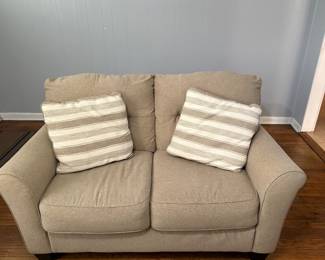 Beige love seat