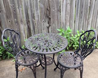 Patio bistro set will accommodate an umbrella