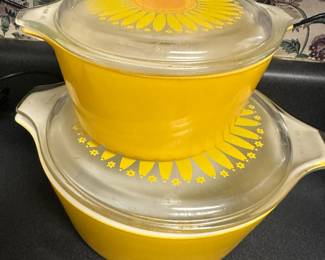 vintage Pyrex casserole dishes in the "Yellow Daisy" or "Sunflower" pattern