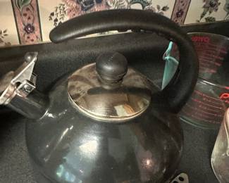 black enameled tea kettle