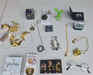 Large Assortment of Harry Potterthemed Collectibles and Accessories