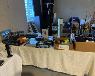 Lots of small iems-pens, sunglasses, flashlights etc