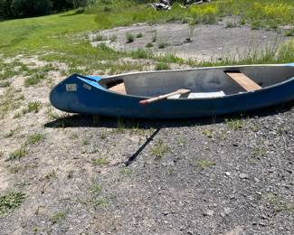 Golden canoe w/ paddle