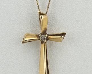14kt chain with 10kt gold cross with diamond