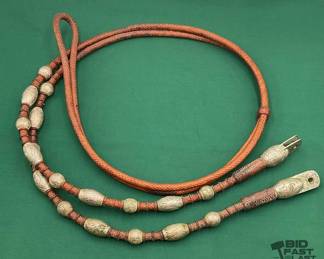 104 Braided leather reins with silver