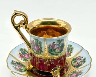 La Reine Limoges Fragonard demitasse cup and saucer set With Gold Accents