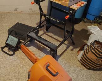 Chainsaw, workhorse, other random tools and work bench with Bose