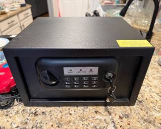 Metal safe with keys