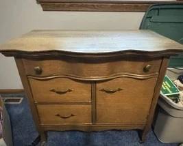 Vintage Scalloped front Dresser with drawers and one door.