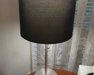 LimeLights . inch Brushed Steel Stick Lamp with Charging Outlet and Black Drum Shade
