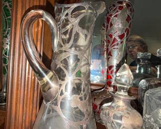 Art Nouveau Glass pitcher with ornate floral silver overlay