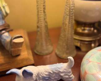 White porcelain terrier figurine and glass bud vases