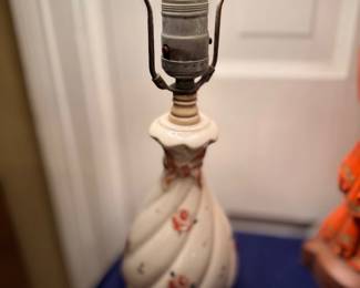 Ceramic draped-base table lamp with floral accents