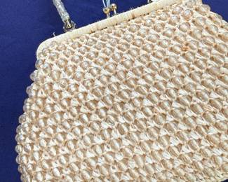 Woven straw handbag