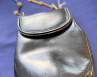 Black leather handbag with bamboo handle
