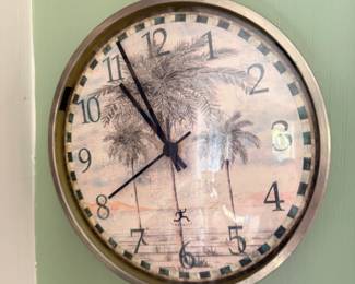 Wall clock with palm tree beach scene