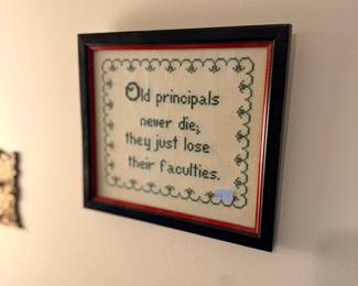 Framed principal cross-stitch sampler