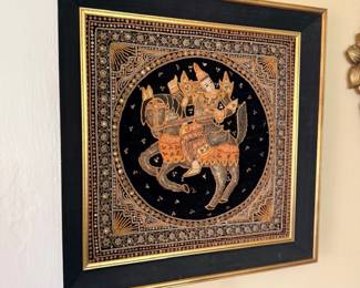 Framed Asian gold-leaf painting with figures on elephant