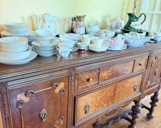 Carved walnut buffet sideboard with barley-twist legs and china