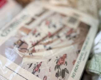 Vintage floral tablecloths in original packaging