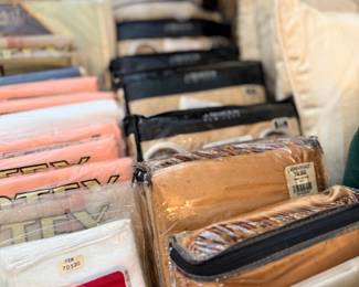 Boxed men's handkerchiefs and packaged vintage linens