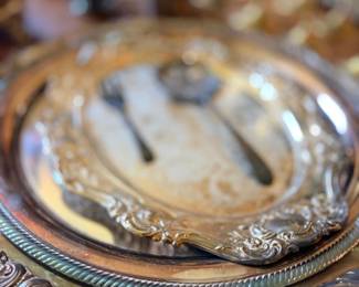 Ornate embossed silver serving platter