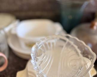 Glass fish-shaped dish and white plates