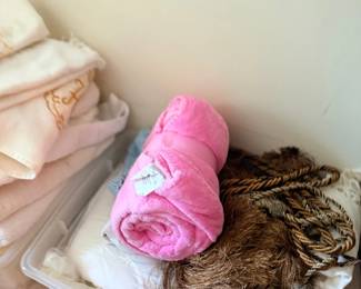 Bins of blankets and linens