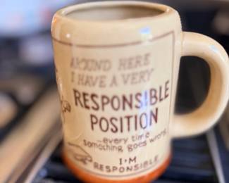 Novelty ceramic coffee mug with humorous text