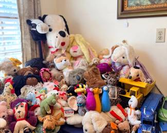 Table of plush stuffed animals and toys
