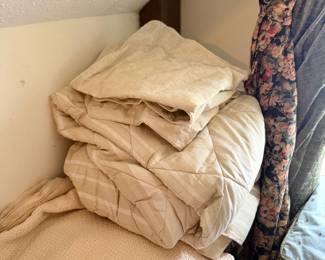 Folded comforters and bedding