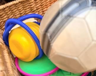 Basket of children's outdoor toys