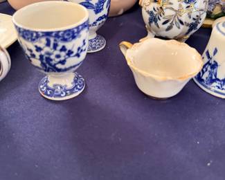 Blue and white porcelain cups and creamers