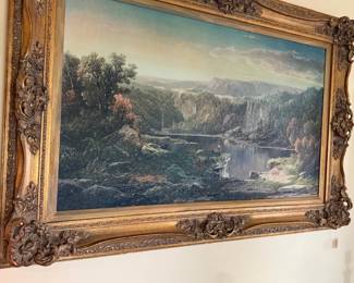 Large gilt-framed landscape oil painting with waterfall