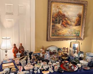 Table of assorted collectibles and figurines