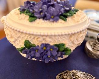 Ceramic covered trinket box with applied violets