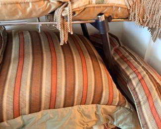 Decorative throw pillows, tapestry and striped