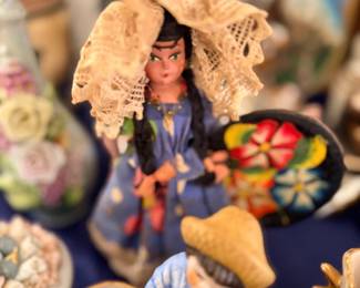 Porcelain figurines of colonial figures