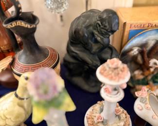 Assorted figurines, vases and floral candlesticks