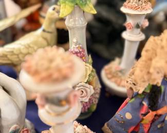 Porcelain candlesticks with applied flowers