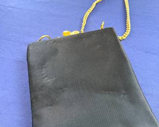 Black satin clutch with gold chain