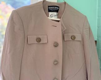 Tan jacket with decorative buttons