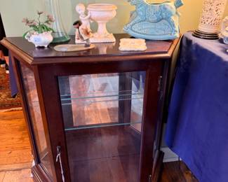 Mahogany octagonal glass-front display cabinet